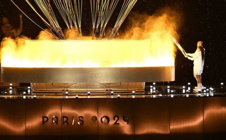 French Olympic heroes Marie-José Pérec, Teddy Riner light cauldron to kick off Paris games