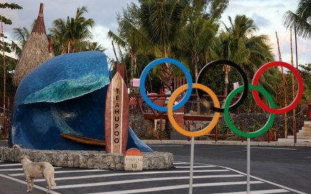 Olympic judge dismissed from Games after photo with athlete, coach surfaces on social media