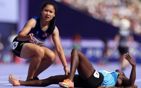 Laotian Olympic sprinter finishes race, turns back to help opponent who collapsed during women’s 100 prelim