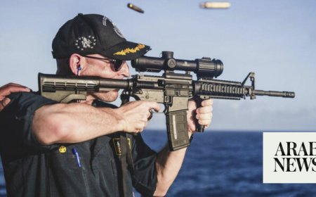 Commander of Navy warship relieved of duty months after backward rifle scope photo flap