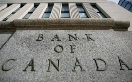 Bank of Canada cuts rates, indicates bigger cut possible