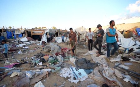 Israeli attacks kill over a dozen people as war on Gaza enters 12th month