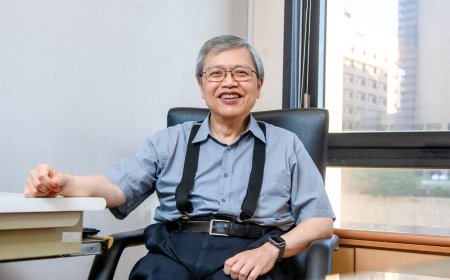 這個處，九成公務員都會寫程式！63歲處長7年堅持，用AI救700位獨居老人｜天下雜誌